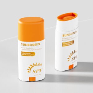 Two sleek white 40g deodorant-style bottles with orange caps (one open) labelled "UVA/UVB/Bluelight Protection" sit on a surface.