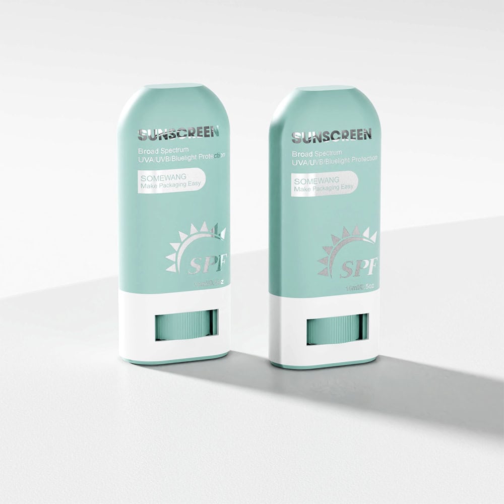 Two mint green "SOMEWANG SPF" sticks, resembling deodorant containers, sit side by side on a white surface with shadows.