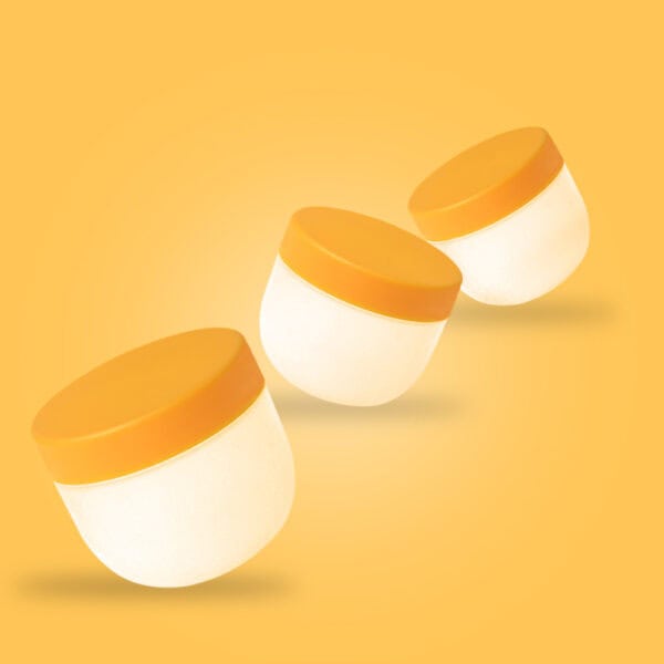 Three white jars with orange lids, labeled SWC-JP50CS 50g, are evenly spaced on a solid orange background.