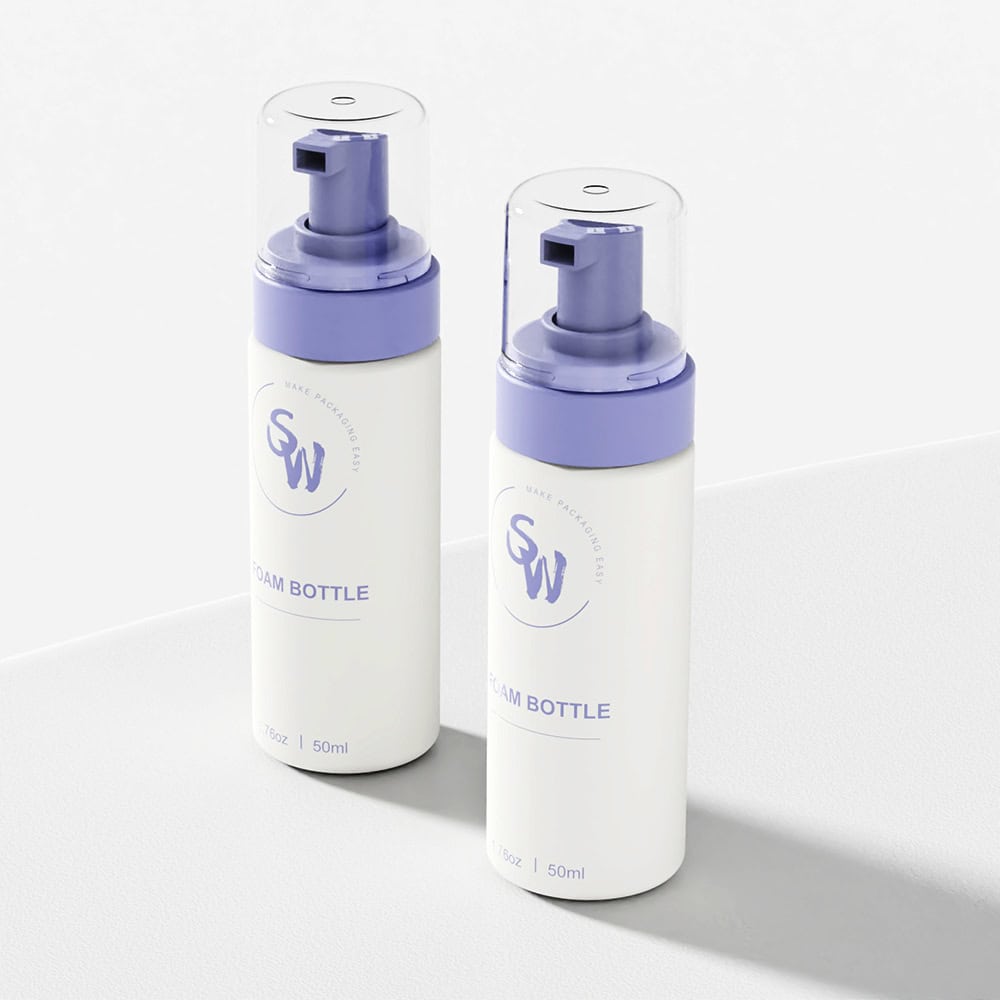 Two identical 50ml HDPE foam bottles with purple "SW" logo caps on gray surface have a sleek, easy-dispensing opening.