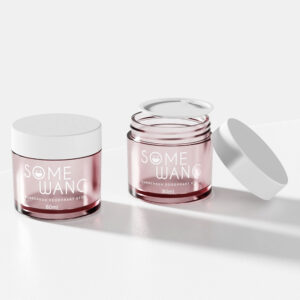 Two pink PETG jars (80/100g) labeled "SOME WANG Sunscreen Deodorant Stick, 80ml," one open and one closed, with white lids.