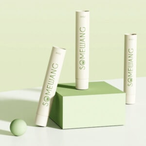 Vegan skincare tubes on pastel green background, eco-friendly cosmetic packaging, SÖMFEUWANG natural beauty products, minimalistic design, sustainable skincare solutions, environmental conscious branding.