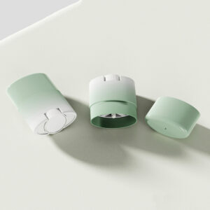 Three pastel mint and white air fresheners in 15g deodorant-style containers are displayed on a light surface.