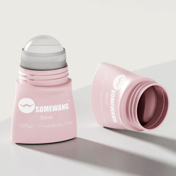 Pink 50ml cylindrical roller bottle, ideal for essential oils and perfumes, by "Somewang." Part of the Mini Roll On collection.