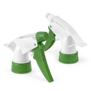 Two spray bottle nozzles, white and green, showcase the precision of the Cleaning Trigger Sprayer 28/400 28/410 on a white backdrop.