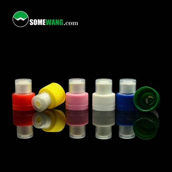 A lineup of eight colorful plastic spray bottles with pull push caps for detergent washing or water bottle on a black background, with the text "somewang.com" at the top.