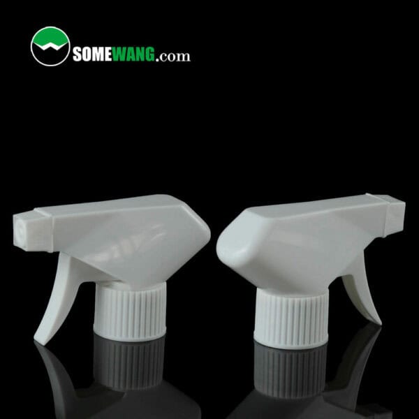 Two 28/410 trigger sprayers on stock against a dark background, with the text "somewang.com" above.