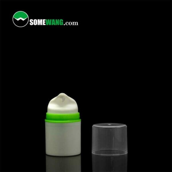 A small SWC-BPA10 Plastic PP cosmetic airless pump bottle with its cap removed, displaying its airless pump dispenser, against a black background with "somewang.com" at the top.