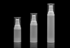 Three white SWC-BPA10RF/30RF/50RF Luxury AS Airless Pump Bottles of varying sizes arranged in a row on a black background.
