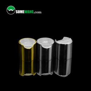 Três recipientes cilíndricos para cosméticos com acabamentos metálicos reflexivos em ouro, prata e preto, equipados com tampas superiores de disco de plástico amarelo, exibidos sobre fundo escuro com o logotipo "somewang.com".