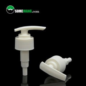 Two 24/410 2 cc spring inside plastic bottle with lotion pump dispenser oem on a dark background, with the website "somewang.com" displayed above in green.