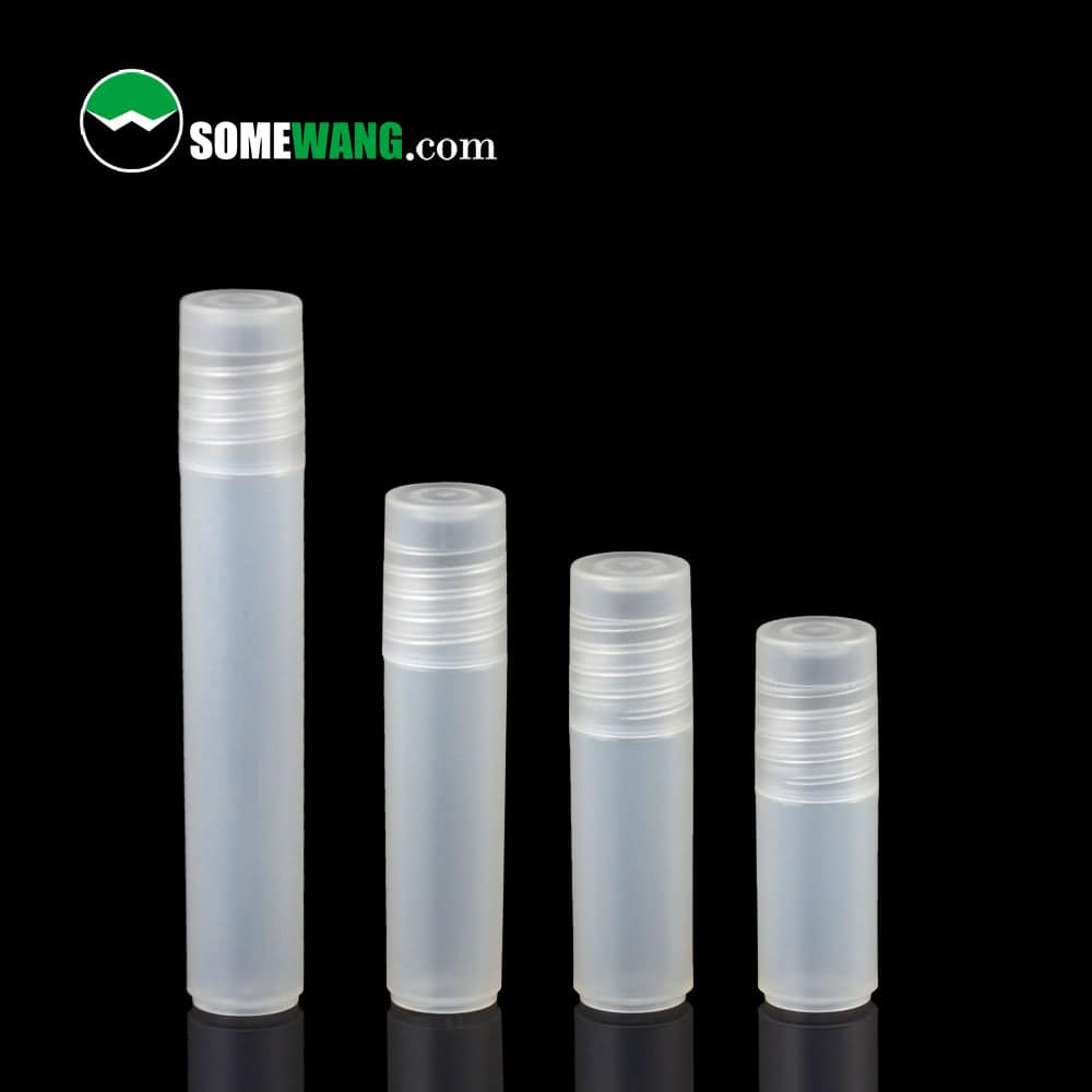 Four transparent cylinders with screw caps, including a 3ml bottle, stand at different heights against a sleek black background.