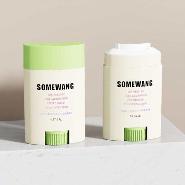 Two 21g PP deodorant stick containers on marble; one with a green cap, the other uncapped showing the twist mechanism.