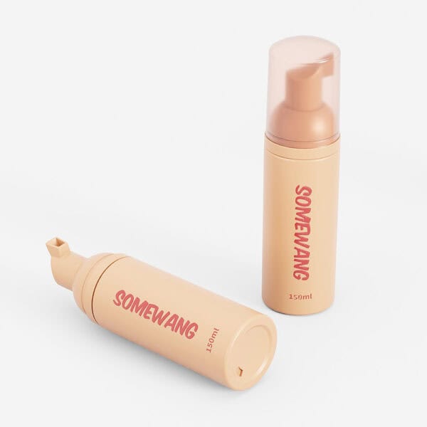 Two beige "Somewang" HDPE bottles on a white background: a 90ml stands upright, and a 300ml lies down.