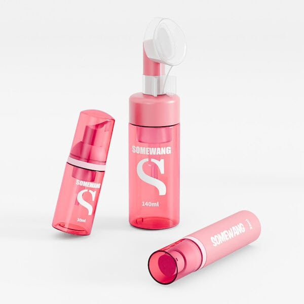 Three pink Somewang cosmetic bottles (30ml foam, 100ml toner, 140ml) are elegantly arranged on a white background.