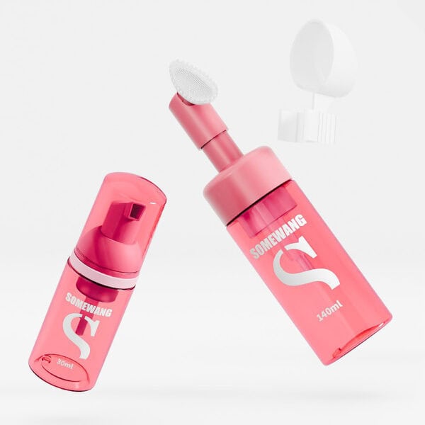 Two pink "SOMEWANG" cosmetic bottles—a 30ml foam pump and one with a sponge tip—float on a pristine white background.