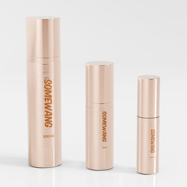 The "Luxury Cosmetic Airless Pump Bottle" set includes three gold bottles (15ml, 30ml, 100ml) labeled "SOMEWANG" for an elegant skincare experience.