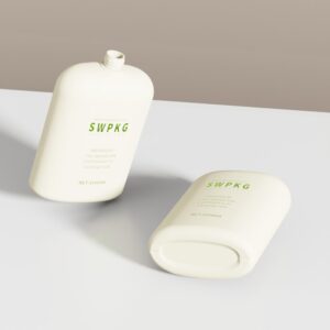Two 1000ml white HDPE SWPKG pump bottles—upright and flat—highlight customizable wholesale solutions.
