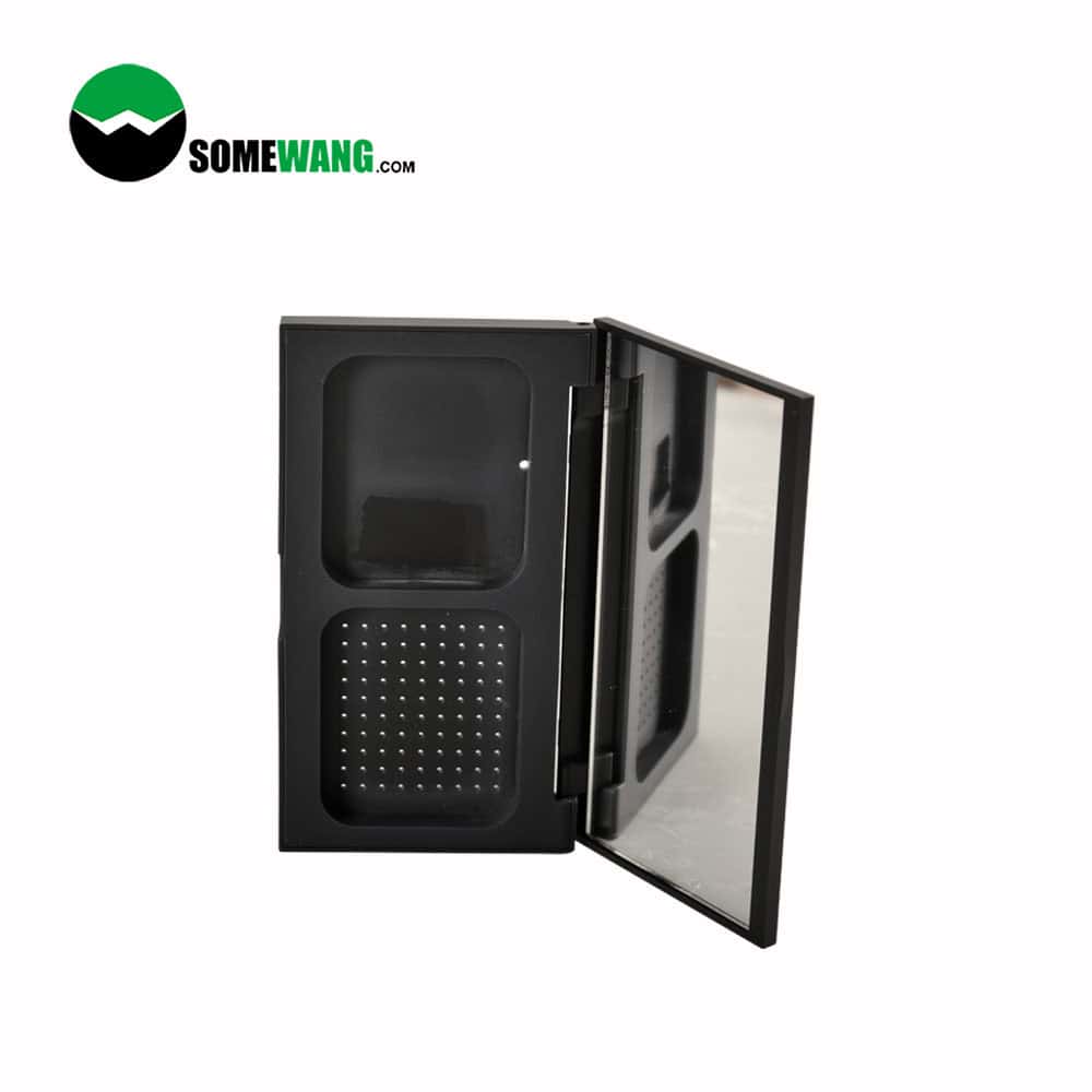 A black rectangular container with a hinged lid, two compartments, and a perforated section. Logo "SOMEWANG.COM" on top left.