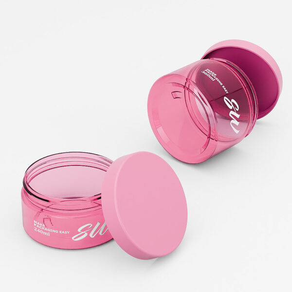 Two pink PET plastic amber skincare jars are shown: one open on its side, and one upright, both with white text for size and branding.