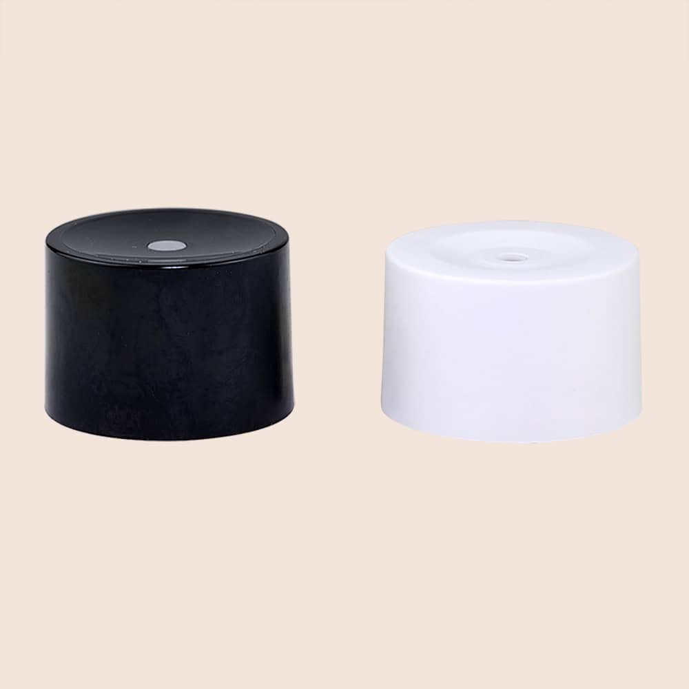 Two round, modern smart speakers, one black and one white, each topped with a 28/400 screw PP cap, isolated on a light beige background.