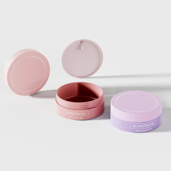 The AS-JP100FS set includes three 100g PP cream jars in pastel pink and lavender, with lids: two open, one closed, branded "Somewang.