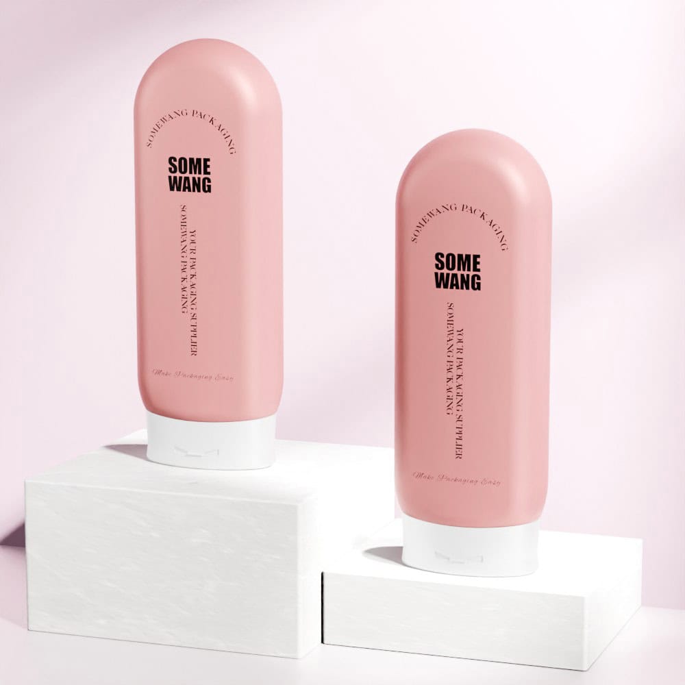 Two pink "300ml Plastic HDPE Upside Down Bottles with Flip-Top Caps" on white display stands against a light pink background.