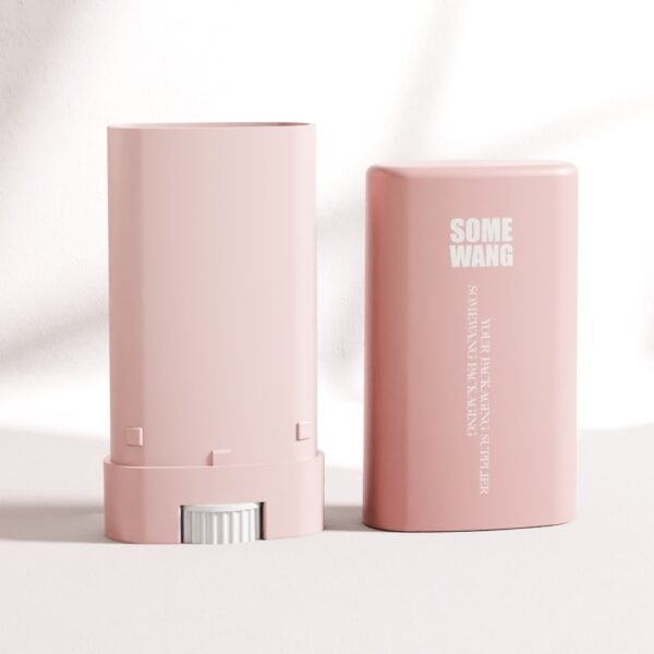 A pink, rectangular 15ML empty deodorant stick tube with a flat oval shape and gray twist dial. Cap off, displaying "SOME WANG" text.