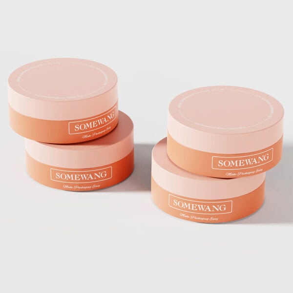 Four pink and orange "SOMEWANG" AS-JP100FS 100g PP cream jars labeled "Make Packaging Easy" are stacked on a white background.