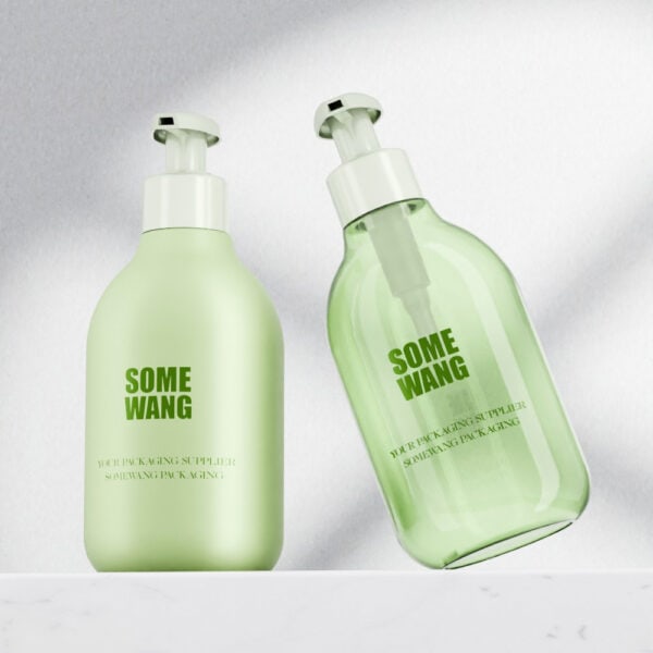 Two green 240ml PET shampoo bottles with treatment pumps, one upright and one tilted, against a white background.