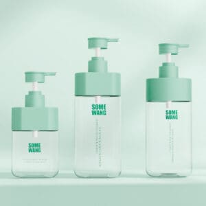 Three clear plastic pump bottles with mint green caps labeled "Customized 300ml 500ml PET Square Bottle with Pump" against a mint green background.