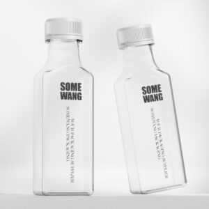 Two clear plastic bottles with silver caps, labeled "Some Wang Your AUTO-DRAFT Packaging Supplier," stand against a white backdrop.