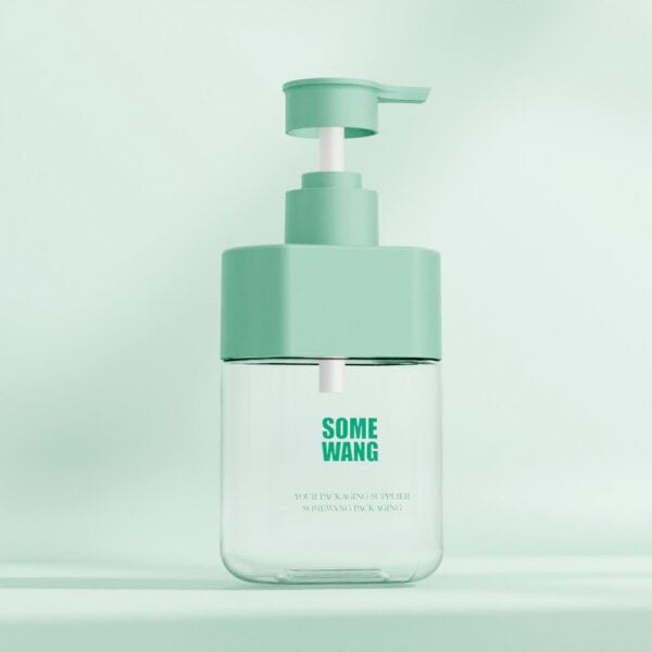 A 500ml flat square PET bottle with a green pump, labeled "Some Wang," sits against a green background for personal care.