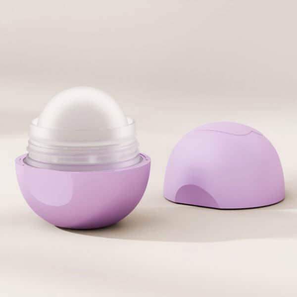 A 10g purple spherical PP Deodorant Stick Container with its lid off, revealing a white rounded applicator inside, placed on a plain surface.