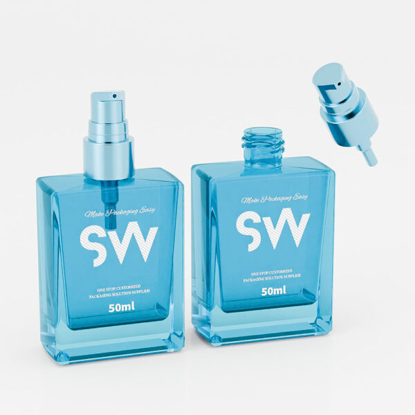 Two "SW" 50ml blue glass cosmetic bottles shown: one with a spray nozzle, one open without a cap.