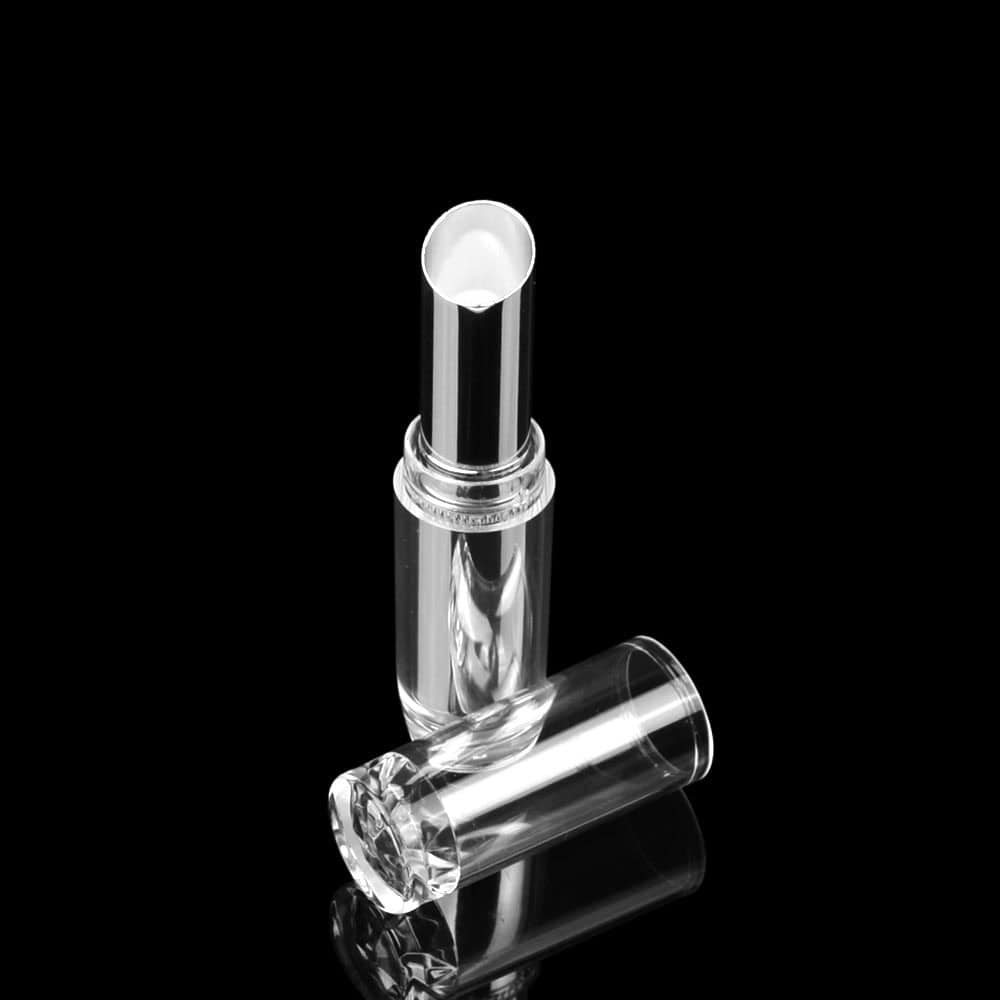 A SWC-CLI004A lipstick tube, cap off, stands upright on a reflective black surface.