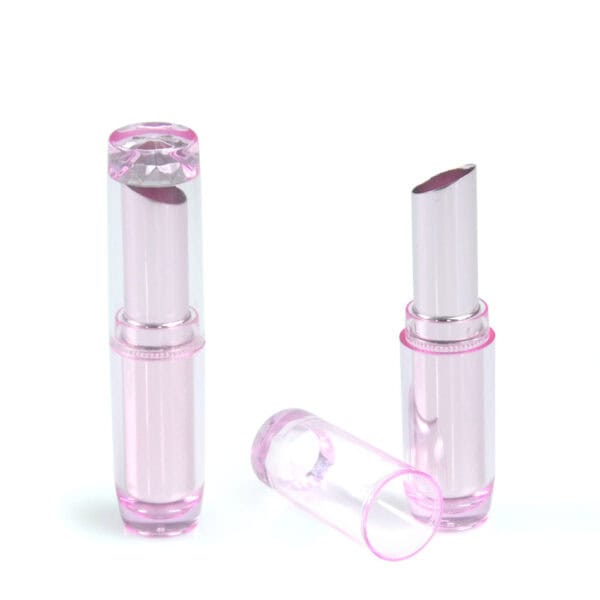 Two pink and silver SWC-CLI004A lipstick tubes, one closed and one open with its cap beside it, on a white background.