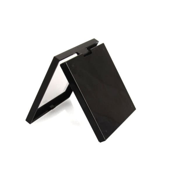 A black square compact mirror, open at an angle, reflects its interior, resembling a sleek 9-pan SWC-CPC013 eyeshadow palette.