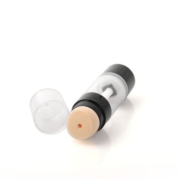 A 30g sponge applicator highlighter with a transparent lid removed, revealing a beige foam tip, ready for application.