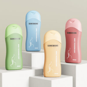 Four 16.9oz HDPE squeeze shampoo bottles (green, blue, beige, pink) labeled "SOMEWANG" on white pedestals.