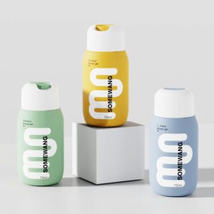 Three 75 ml SOMEWANG HDPE Round Shoulder Bottles with Disc-top Caps: two green and blue on a surface, one yellow on a white cube.