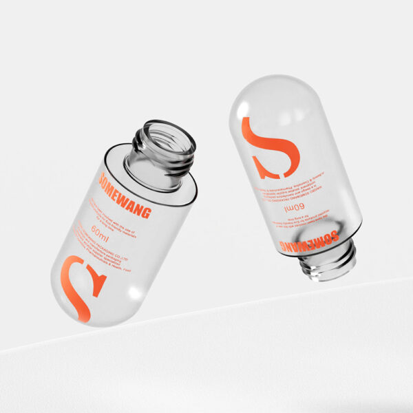 Two 240ML transparent PE plastic bottles for lotion with orange labels float on a light background, one upright, one upside down.