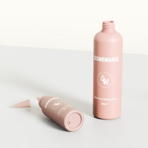 Two 100ML HDPE "SOMEWANG" body wash bottles on a white surface, one upright, one lying down with cap off.