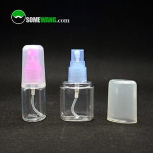 Three 30ML colored PET bottles with transparent caps and pink/light blue pumps are shown against a black background. "SOMEWANG.com" logo is in the upper left.