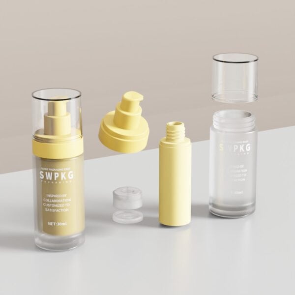 Rozebrane szklane butelki na olejki eteryczne o pojemności 30 ml i 50 ml z żółtymi pompkami, ukazujące części zewnętrzne i wewnętrzne na neutralnej powierzchni.