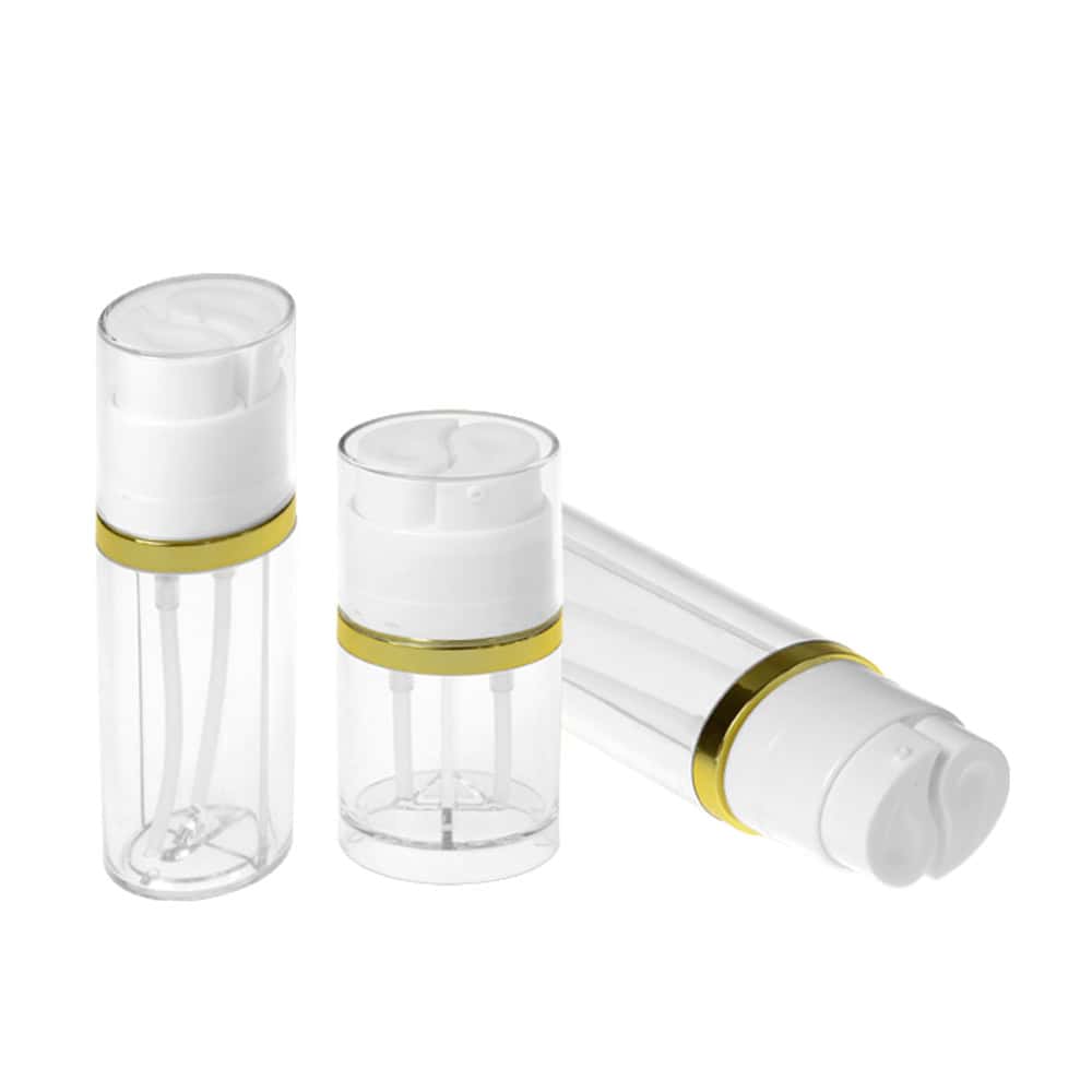 The image shows three clear pump bottles with gold accents and white caps, including a 50/100/150ml AS Double Chamber Lotion Bottle.