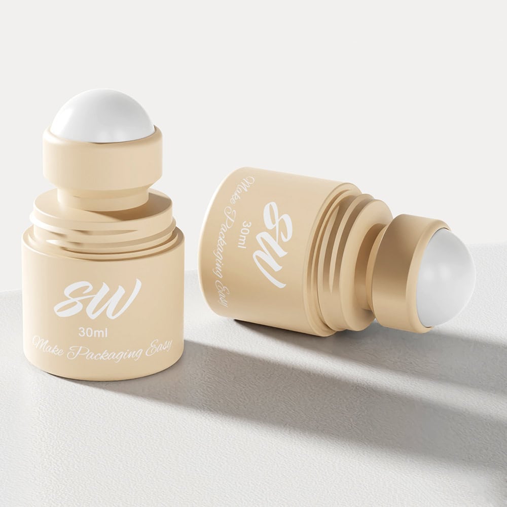 SW Make Packaging Easy에서 출시한 베이지색 30ml 롤온 병 두 개(한 개는 세워져 있고 다른 한 개는 눕혀져 있음)는 세련된 디자인을 자랑합니다.