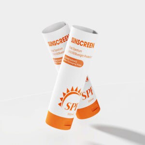Dwie białe tubki 350 ml na balsam, pomarańczowe zakrętki, informacje o SPF i logo łączą styl z ochroną.