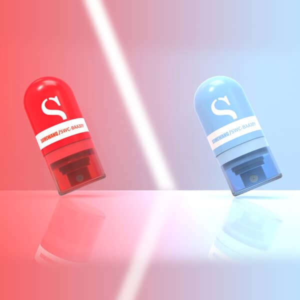 A red and blue capsule on a reflective surface highlights the eco-friendly, sleek design of biodegradable cosmetic tubes.