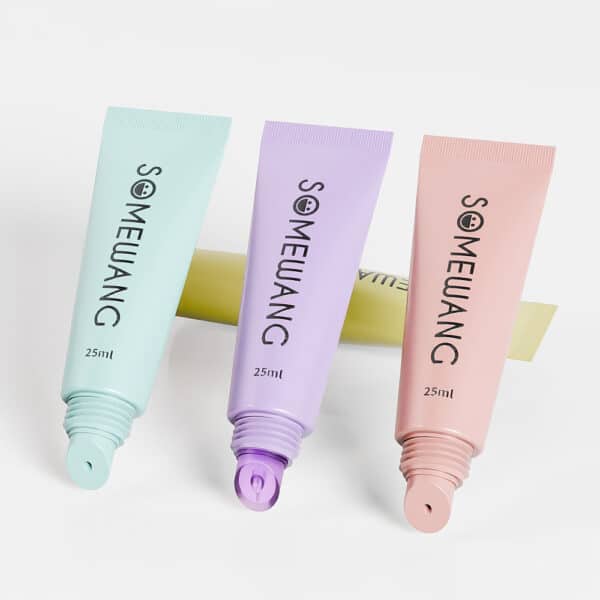 Set of three 25ml lip gloss tubes in pastel green, purple, and pink (D19mm) against a plain background.